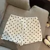 Tiro Real de una Falda Satinada de Lunares Estilo Francés Anti-Exposición para Mujer, Falda Corta Adelgazante Línea A Temporada de Primavera