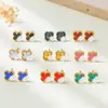 Joyería de Acero Inoxidable de Trébol de Cuatro Hojas Transfronteriza para Mujer, Pendientes Simples de Lujo Ligero, Pendientes Pequeños y Exquisitos de Acero de Titanio de 9 mm