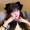 Horquilla para el pelo con lazo de terciopelo negro extragrande y rígido de estilo francés superior, accesorio exagerado para el cabello de rostro pequeño.