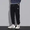 Pantalones Casuales de Marca Pesada de Moda para Hombre Otoño e Invierno Pierna Ancha Pantalones con Forro Polar Engrosados Cálidos Moda Pantalones Deportivos