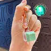 Llavero colgante de Tetris de nueve teclas de moda en colores macaron, accesorio de juguete de botón para aliviar el estrés, venta al por mayor
