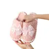 Novas pantufas peludas com laço transfronteiriças para mulheres, outono e inverno, solado grosso, quentes, antiderrapantes, de algodão para casa, estilo para meninas de interior