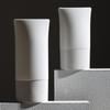 Botella de loción de PE de 30 g y 50 g, botella de protector solar prensado, crema aislante, crema de manos, productos para el cuidado de la piel embotellados, manguera invertida