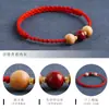Pulsera de Madera de Durazno Real Cinabrio con Cordón Rojo Tejido para Hombres y Mujeres para Protegerse y Garantizar la Seguridad en el Año de Nacimiento, Buena Suerte para Niños y Estudiantes
