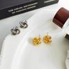 Moda Europea y Americana Transfronteriza Estilo Metal Geométrico Nudo Flor Aretes S925 Personalidad Combinable Aretes de Alta Gama Joyería