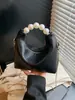 Bolsa de Mão Pérola com Design de Nicho da Moda para Mulheres, Nova Bolsa Transversal de Corrente de Alto Padrão, Bolsa Fresca Formato Bolinho