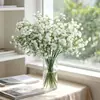 Atacado de flores gypsophila artificiais de haste única para vendas transfronteiriças, usadas como adereços de foto, ornamentos decorativos e decorações de casamento.