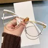 2026 Novos Óculos Planos Femininos com Formato Cat-Eye, Armações de Metal da Moda Levemente Luxuosas, Óculos Rosa Retrô Tendência Atacado