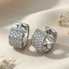 Pendientes de superventas transfronterizos europeos y americanos, cierres de oreja de circonita de cobre, totalmente incrustados de diamantes, adecuados para ir al trabajo, con un toque de lujo ligero y de alta gama, pendientes para mujer