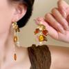 Aretes de borla de circonio de garra de alta calidad con aguja de plata 925 para mujer, temperamento de nicho de lujo ligero, aretes largos, aretes adelgazantes para rostro redondo
