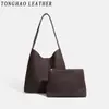 Bolso tejido vintage de gran capacidad para mujer, nuevo bolso de hombro versátil de otoño 2026, versión coreana bolso tipo cubo simple para el día a día