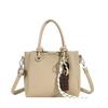 Venta al por mayor Más vendido Nicho Estilo Simple Color Sólido Bolso de Cubo Portátil para Viajero Todo Combinable de Alta Gama Estilo Occidental Bolso Bandolera para Mujer
