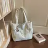 Bolsa tote de moda estilo coreano com estampa de estrelas para mulheres, grande capacidade, adequada para estudantes, casual, versátil e pode ser carregada como bolsa de ombro ou bolsa de mão para o trajeto