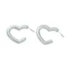 Pendientes versátiles de temperamento de alta gama estilo Hepburn de Instagram pendientes en forma de corazón pendientes de botón de corazón tridimensionales exquisitos a la moda simples