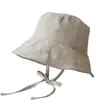 Sombrero de pescador con cordones para niños de Corea del Sur, Xia Dong Gate, compra en el blogger, el mismo sombrero ligero, resistente al viento y con cuerda para el sol.