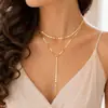 Cadena de suéter larga y redonda de moda callejera transfronteriza europea y americana, collar de metal simple con lentejuelas y borlas al por mayor