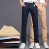 Pantalones de moda juveniles ajustados, pantalones para hombre estilo Harajuku nuevo, pantalones casuales, pantalones negros de vestir de rendimiento