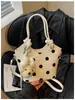 Bolsa de mano, bolso de hombro, bolsa tote, bolsa de trabajo, bolsa tipo cubo versátil, nuevo diseño de lunares de nicho estilo coreano, Primavera/Verano 2026