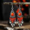 Nuevos aretes turquesa Aretes étnicos multicapa con incrustaciones de diamantes estilo retro de aleación Suministro al por mayor de aretes de borlas de Yunnan