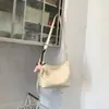 Bolso de moda coreana elegante para mujer con estampado de lichi, bolso tipo dumpling, nuevo bolso de hombro y cruzado simple de verano 2026 para el día a día