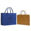 Bolsa de fieltro hecha a medida para baby showers, eventos corporativos, Festival de Primavera, recuerdos de boda, bolsa de mano, bolso de mano de fieltro, hecho a mano