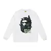 Otoño e invierno estilo japonés marca de moda cabeza de simio estampado de dibujos animados unisex joven suéter sudadera holgada venta al por mayor y dropshipping