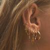 Exclusivo transfronterizo para aretes de rubí de cadena cruzada originales de ins europeos y americanos, aretes de círculo retro, joyería para la oreja femenina