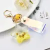 Llavero pentagrama creativo relleno de aceite transfronterizo para coches, mochilas, regalos de pareja, colgante pequeño, venta al por mayor de comercio exterior