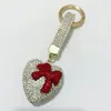 Llavero de corazón de diamantes completos colgante para llave de coche etiqueta de moda se puede abrir llavero de amor