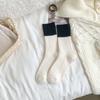 Calcetines gruesos para niños, línea gruesa, tubo cálido, calcetines para mujer, venta al por mayor, otoño e invierno, nuevo color, calcetines cálidos de felpa imitación lana