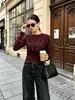 Top de punto plisado de cuello redondo transfronterizo, colección otoño 2026, capa interior elegante, camiseta básica de manga larga de color liso, moda femenina de alta gama