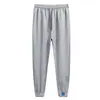 Calça de Moletom Masculina Primavera e Outono Calça com Cordão Solta Casal Cor Sólida Casual Esportiva Calça de Moletom Suporte para Estampa Masculina e Feminina