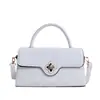 Bolso de mujer nuevo con hebilla de trébol de cuatro hojas, clásico y moderno, diseño de solapa versátil y casual, sensación de alta gama, para llevar en la mano, al hombro y cruzado