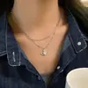 Collar de plata rota con amor Saturno de circón microincrustado para mujer, doble cadena apilada en la clavícula, cadena para suéter de lujo ligero de alta gama para mujer