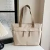 Bolsa Tote Estilo Japonês Feminina Estilo Ocidental Grande Capacidade Bolsa de Lona 2024 Nova Moda Popular na Internet Moda de Luxo Nicho Bolsa de Ombro