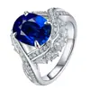 Anillo Real Azul Zafiro Lujoso Incrustado con Diamantes Completos Shake Voice Express Live Anillo Tesoro de Color Diamante Rojo y Amarillo