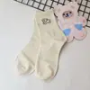 Meias meias de cano médio ins da moda versátil versão japonesa coreana outono inverno desenho animado fofo estilo acadêmico meias longas brancas femininas