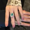 Nuevo anillo de cola de pavo real verde de lujo y sofisticación para mujer, estilo de corte ins, joyería versátil y elegante para el dedo índice