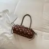 Bolso de axila de gamuza francesa para mujer 2026 Otoño temprano Nuevo de gran capacidad con lunares Bolso de hombro Bolso baguette retro para el trabajo