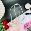Bolso Cruzado Tejido a Mano Perla Blanca Diseño de Nicho Billetera Malla Hueca Fiesta Nocturna Bolso Pequeño Exquisito
