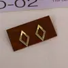 Pendientes Europeos y Americanos Transfronterizos Sencillos y de Alta Gama con Diseño de Rombo de Doble Capa para Mujer con Diseño de Nicho Hueco Pendientes Personalizados para Mujer