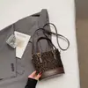 Bolsa de Leopardo de Nicho Súper Popular de Comercio Exterior para Mujer Nueva Moda Otoño e Invierno 2025 Bolso Cruzado Versátil Bolso de Hombro Bolso Cubo