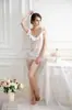 Fabricantes de lencería sexy al por mayor Lencería sexy para mujer con borlas en el dobladillo, traje pequeño sexy 6323