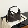 Super Caliente Esenciales de Oficina Bolso Tote Pequeño para Mujer 2026 Nuevo Verano Popular Textura Tejida Bolso de Hombro Único Bolso Cruzado para Viajar al Trabajo
