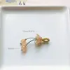 Precio mayorista directo de fábrica pulsera hecha a mano pulsera con colgante diy accesorios pequeños deslizantes colgante de garra de gato lindo Joker