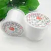 Un plato lleno de diversos materiales para abalorios DIY, Hilo de pesca de nylon transparente, Accesorios para joyería, Hilo de pesca de cristal no elástico
