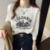 Camiseta Blanca de Puro Algodón de Manga Larga para Mujer Primavera 2026 Nuevo Estilo Americano Estampada de Cuello Redondo Prenda Básica Holgada