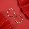 Pendientes de acero de titanio exagerados de oro nuevos transfronterizos fabricantes mayoristas Europa y Estados Unidos pendientes redondos geométricos de acero inoxidable 30 mm