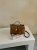 Bolso de mano tipo almohada retro de nicho coreano transfronterizo para mujer, nuevo y elegante bolso de hombro y cruzado de alto valor para el día a día