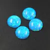 Venta al por mayor del fabricante Ópalos Sueltos Piedras de Ópalo Sintético Ópalo Artificial Redondo Forma de Huevo Fondo Plano Cara de Anillo de Ópalo Liso